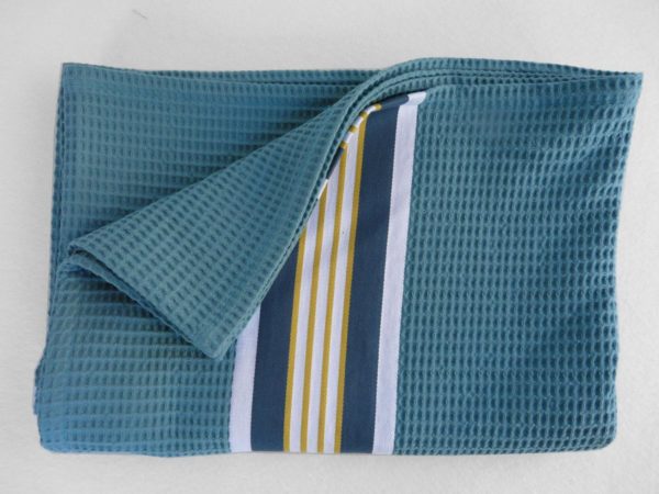 Drap de bain en coton bleu NID D'ABEILLE
